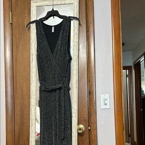 Sparkle in this Black/Silver Jumpsuit